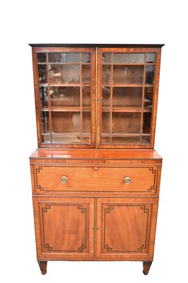 Lot 1424 - Good Regency mahogany and ebony line inlaid secretaire bookcase