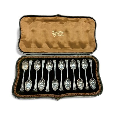Lot 929 - Set of twelve late Victorian silver teaspoons, (London 1898), in a velvet lined fitted case.