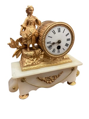 Lot 205 - Small 19th century Continental alabaster and gilt metal clock with drum movement and figural surmount