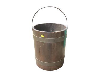 Lot 1418 - Antique mahogany and brass bound bucket with swing handle