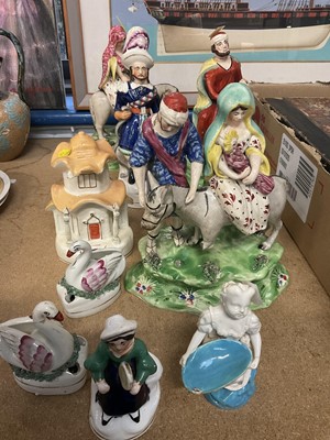 Lot 237 - Three early 19th century Staffordshire figures, including Moses, Nativity group and another together with other Staffordshire items