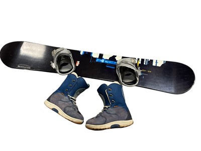 Lot 822 - Salomon snowboard with burton snowboarding boots (size UK 11) together with pair Head skis and poles and Head skiing boots