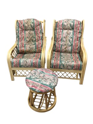 Lot 5331 - Cane conservatory suite including two armchairs, two swivel chairs, two foot stalls and a coffee table