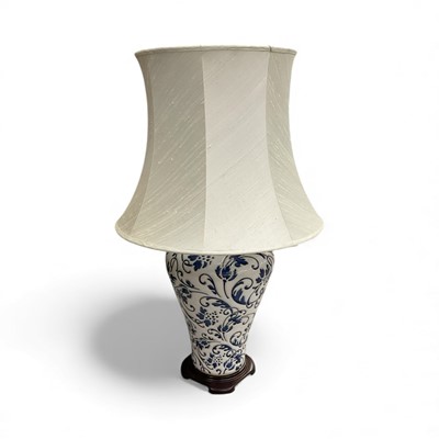 Lot 120 - Large blue and white porcelain vase with foliate pattern, 84cm high including shade