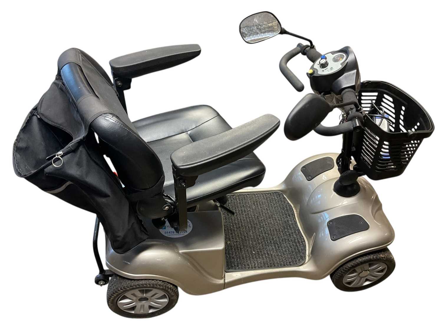 Lot 7 - Grey Care Co mobility scooter with charger and