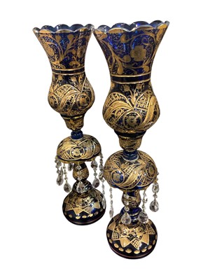 Lot 273 - Pair of antique Bohemian blue glass and gilt heightened lustres