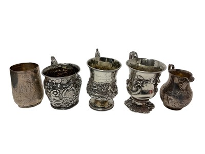Lot 232 - Four Georgian and later silver christening mugs of varying form with engraved inscriptions