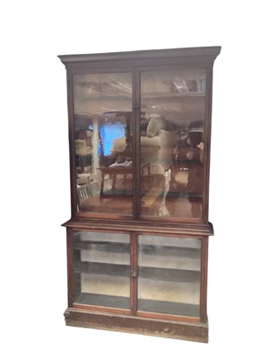 Lot 1452 - Victorian mahogany two height bookcase with shelved interior enclosed by glazed doors, 125.5cm wide, 31cm deep, 224cm high