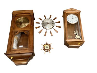Lot 304 - 1930s mantle clock, three wall clocks, starburst style clock and two barometers