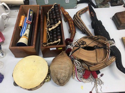 Lot 325 - Three carved painted wood crocodiles, African beaded ceremonial hat, various instruments etc