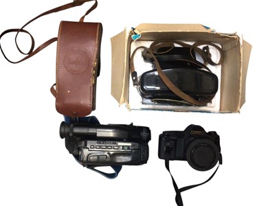 Lot 327 - Group of vintage cameras including Canon, Sony camcorder, lenses and accessories