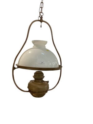 Lot 286 - Brass hanging oil lamp with shade