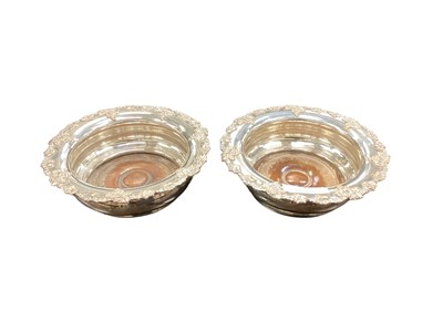 Lot 348 - Pair of late Victorian silver plated wine coasters