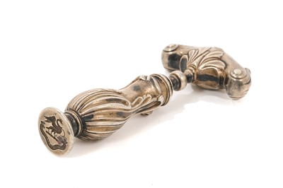 Lot 793 - 19th century continental white metal corkscrew with intaglio seal