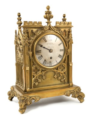 Lot 663 - Victorian Gothic-style brass mantel clock