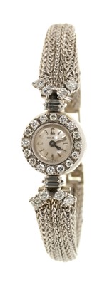 Lot 575 - 1960s ladies' Omega 18ct white gold and diamond cocktail watch, boxed with original paperwork