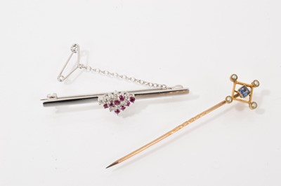 Lot 461 - Edwardian sapphire and seed pearl stick pin and an 18ct white gold diamond and ruby cluster brooch