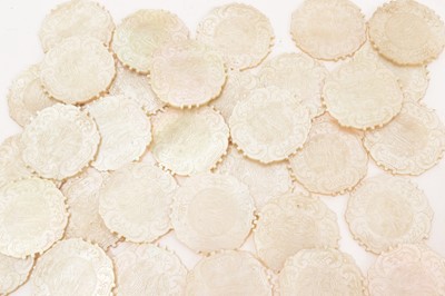 Lot 731 - Collection of thirty three 19th century Chinese carved mother of pearl gaming counters
