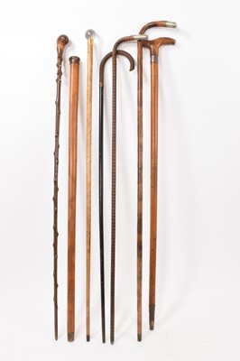Lot 746 - Collection of eight antique walking sticks