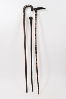 Lot 751 - Horn washer walking stick and two others similar
