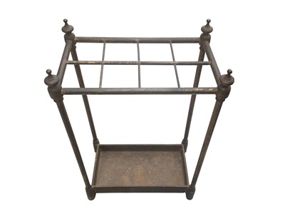Lot 1466 - Victorian brass and iron stick stand, with eight divisions and integral drip tray, 40cm wide x 23cm deep x 65cm high