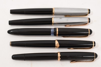 Lot 765 - Pair of Mont Blanc fountain pens, with 14ct gold nibs, 13cm long