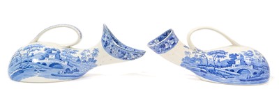 Lot 78 - Unusual pair of Copeland & Garrett blue and white transfer printed male and female urinals, circa 1840, in the Spode Tower pattern, 30cm and 32cm long