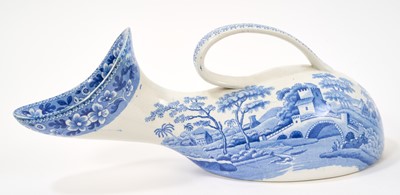 Lot 78 - Unusual pair of Copeland & Garrett blue and white transfer printed male and female urinals, circa 1840, in the Spode Tower pattern, 30cm and 32cm long
