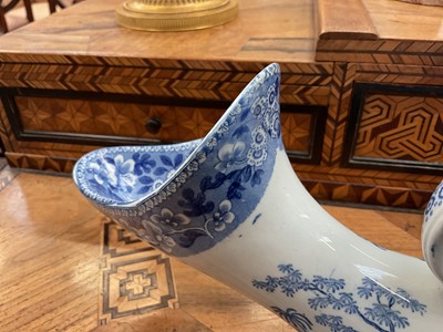 Lot 78 - Unusual pair of Copeland & Garrett blue and white transfer printed male and female urinals, circa 1840, in the Spode Tower pattern, 30cm and 32cm long