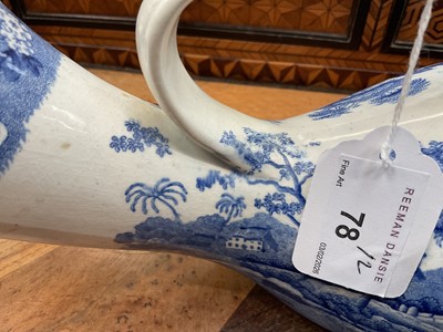 Lot 78 - Unusual pair of Copeland & Garrett blue and white transfer printed male and female urinals, circa 1840, in the Spode Tower pattern, 30cm and 32cm long