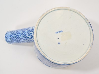 Lot 80 - Early 19th century blue and white Spode spittoon, printed in the Tower pattern, 'Spode' stamp to base, 17.5cm across including handle