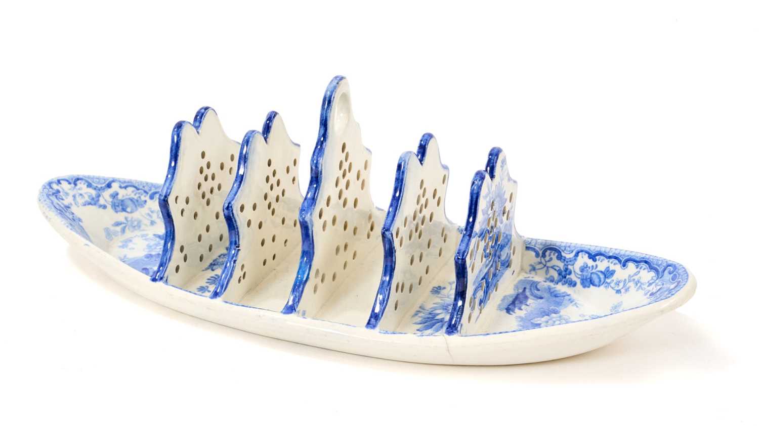 Lot 81 - Early 19th century blue and white Spode toast rack, printed in the Fruit and Flower pattern, impressed and printed 'Spode' marks, 24cm wide