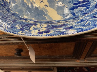 Lot 82 - Large early 19th century blue and white circular meat platter, printed in the Bridge of Lucarno pattern, 37.5cm diameter