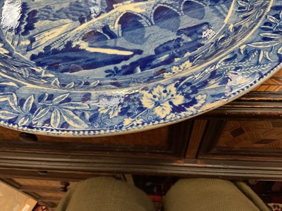 Lot 82 - Large early 19th century blue and white circular meat platter, printed in the Bridge of Lucarno pattern, 37.5cm diameter