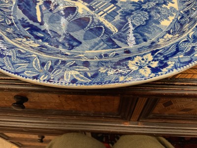 Lot 82 - Large early 19th century blue and white circular meat platter, printed in the Bridge of Lucarno pattern, 37.5cm diameter