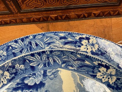 Lot 82 - Large early 19th century blue and white circular meat platter, printed in the Bridge of Lucarno pattern, 37.5cm diameter