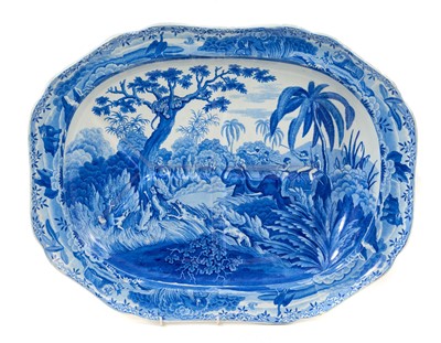 Lot 84 - Impressive early 19th century Spode blue and white 'well and tree' platter printed with the Indian Sporting scene 'Shooting a Leopard', impressed and printed 'Spode' marks, 53cm wide
