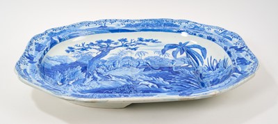 Lot 84 - Impressive early 19th century Spode blue and white 'well and tree' platter printed with the Indian Sporting scene 'Shooting a Leopard', impressed and printed 'Spode' marks, 53cm wide