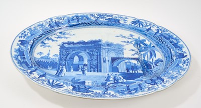 Lot 85 - Early 19th century Spode blue and white oval 'well and tree' platter, printed with the Caramanian Triumphal Arch of Tripoli in Barbary, impressed 'Spode' mark, 52.5cm wide