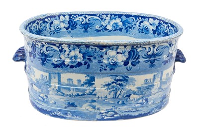 Lot 87 - Rare early 19th century blue and white foot bath, printed with Llanthony Abbey, Monmouthshire, alongside various castle ruin prints and a pineapple border, titled stamp mark to base with additio...