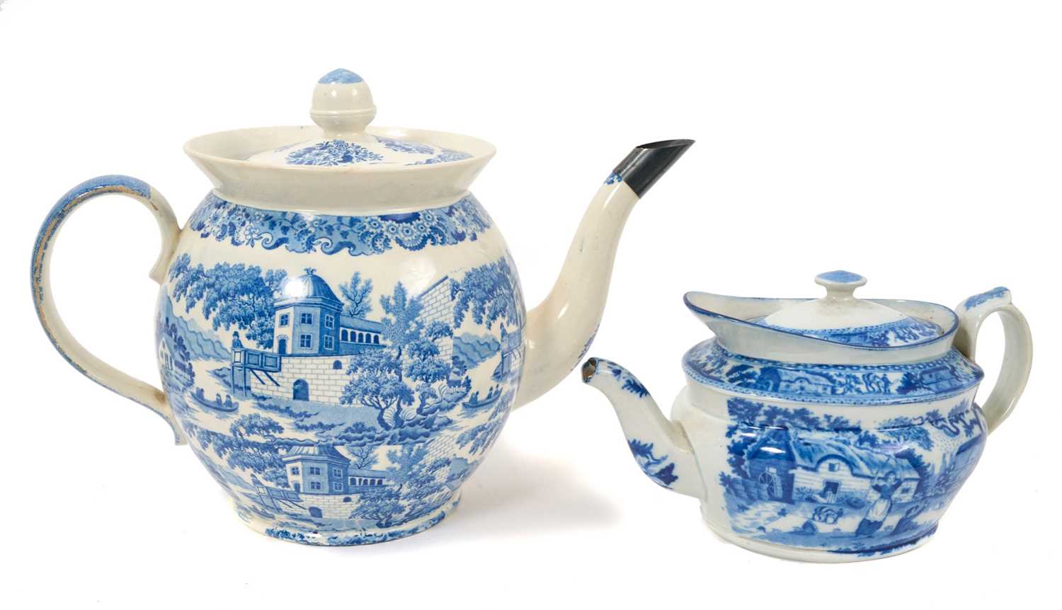 Lot 88 - Large early 19th century blue and white punch pot and cover, printed with chinoiserie scene, 32.5cm from spout to handle, together with a blue and white teapot with rural scene, 23cm (2)