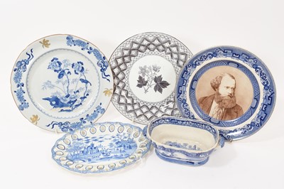 Lot 91 - Group of blue and white printed items including two Spode plates, a Spode basket stand, a sauce tureen base in Wild Rose pattern, etc (5)