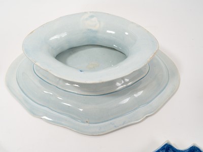 Lot 93 - Early 19th century blue and white pickle set, of lozenge form on pedestal base, with five small fitted dishes, printed with the Flower Cross pattern, 28cm across