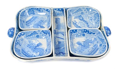 Lot 94 - Early 19th century Spode blue and white twin-handled pickle set / hors d'oeuvre dish, of shaped square form, printed with the Castle pattern, with four dishes and central divider, 28.5cm wide