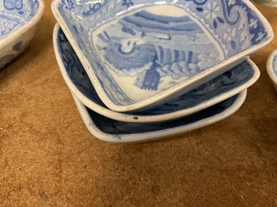 Lot 94 - Early 19th century Spode blue and white twin-handled pickle set / hors d'oeuvre dish, of shaped square form, printed with the Castle pattern, with four dishes and central divider, 28.5cm wide
