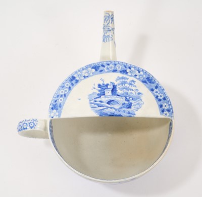 Lot 95 - Early 19th century pair of Spode blue and white invalid feeder/s, one printed with Queen Charlotte, the other with the Tower pattern, both with stamped marks, 18.5cm and 20cm across