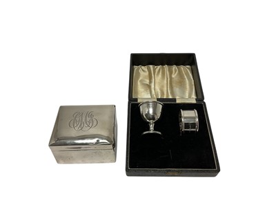 Lot 239 - Group of miscellaneous silver and white metal napkin rings and a miniature trophy cup (various dates and makers). Approximately 4ozs weighable silver. (Qty).