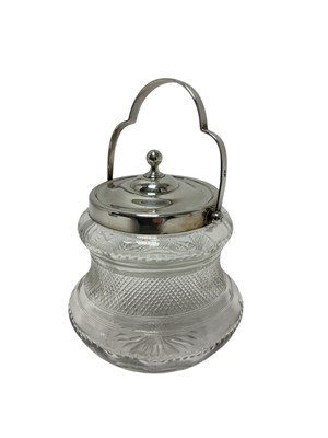 Lot 337 - Glass biscuit barrel with hallmarked silver lid, handle and rim