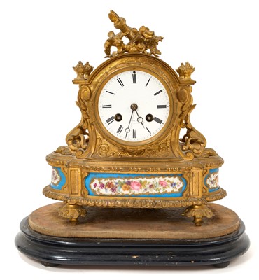 Lot 676 - Late 19th century ormolu gilt mantel clock with porcelain panels, the dial signed Blaqaurt Bologne