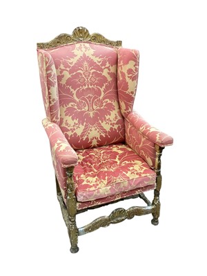 Lot 1449 - 18th century giltwood wing armchair